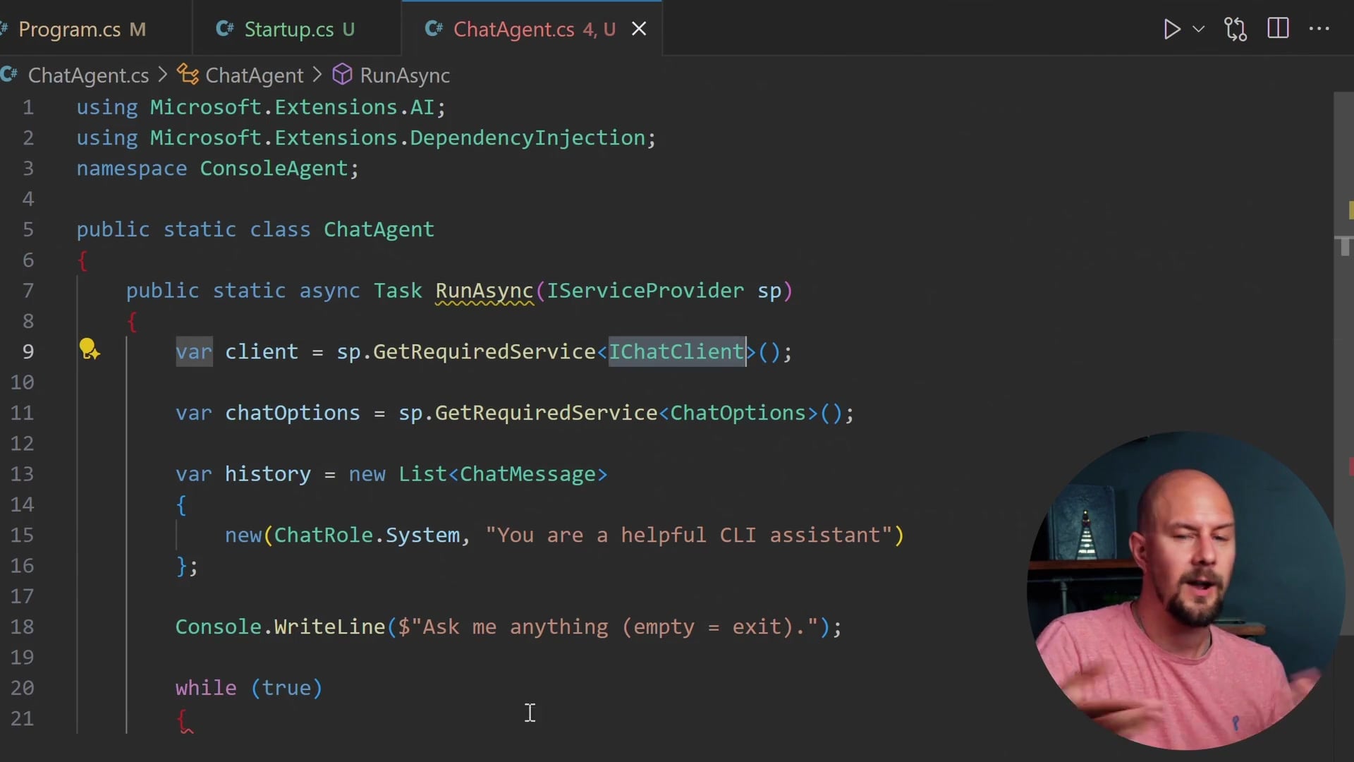 Code snippet showing the using statements and DotEnv.Load call in Program.cs